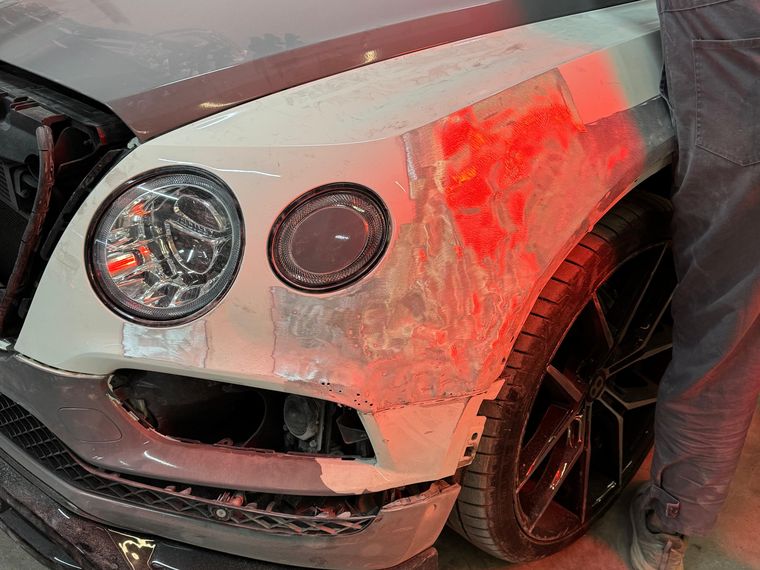 Bentley Bentayga front wing filled and guide coated ready for paint