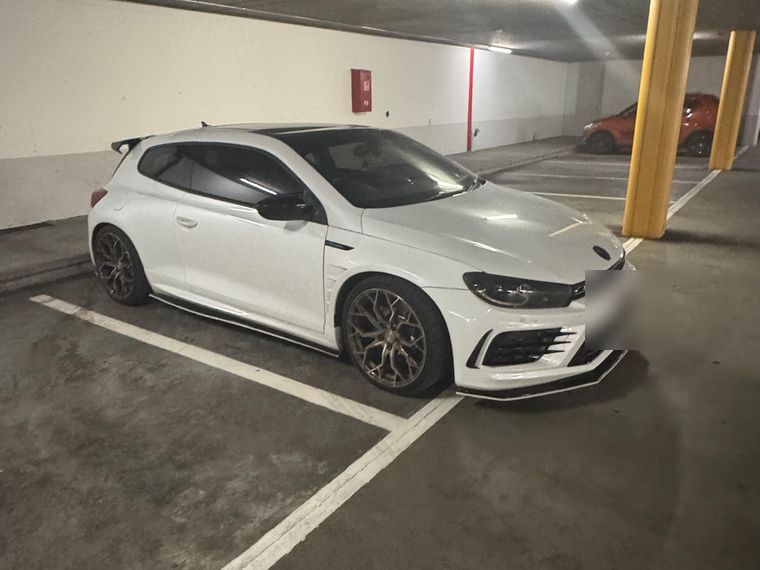 White Volkswagen Scirocco R with finished paintwork, back with its owner